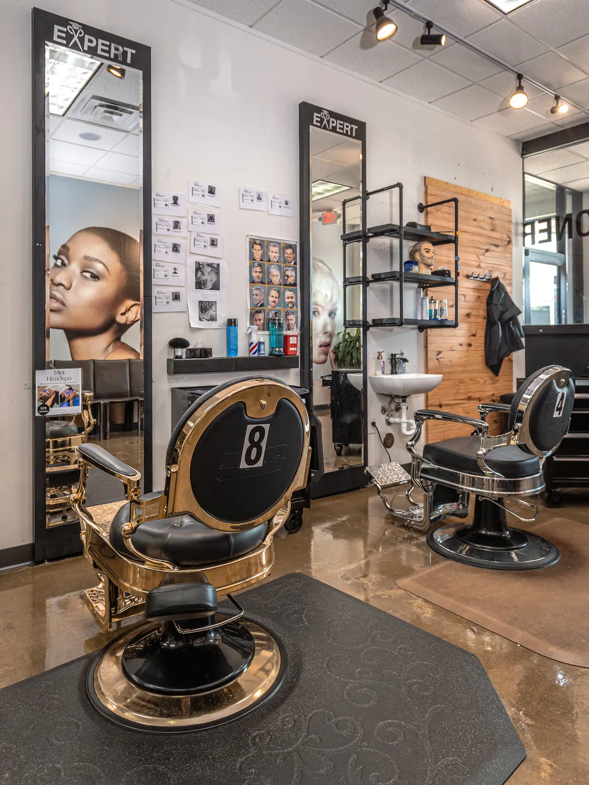 Gold barber chair at a training station inside Expert Barber Beauty Academy