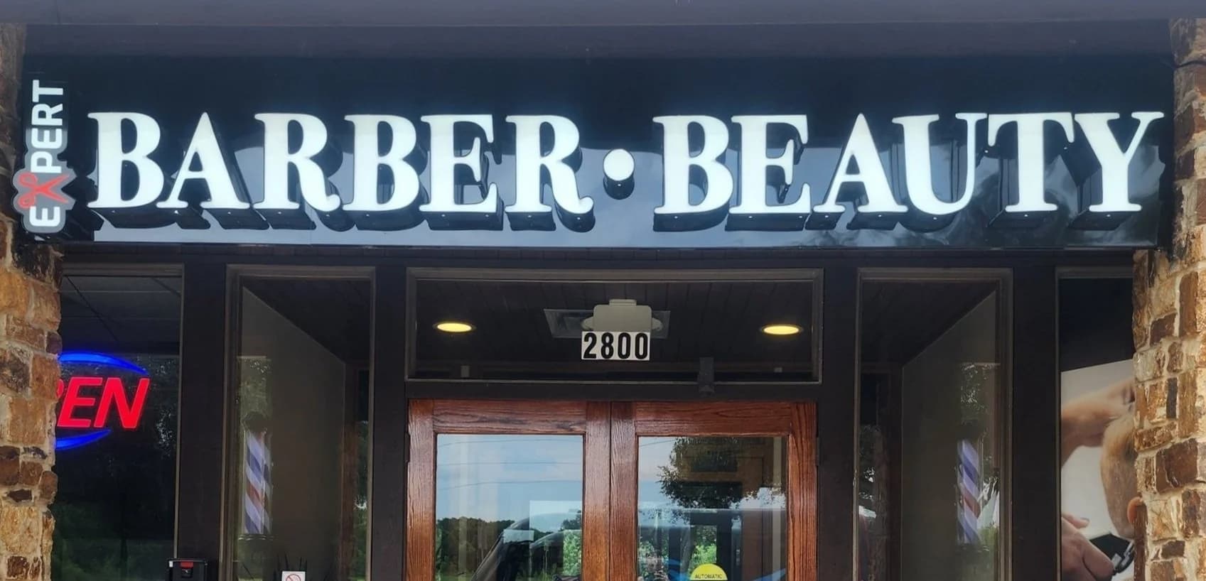 Storefront of Expert Barber & Beauty School at 2800 Virginia Pkwy in McKinney, TX